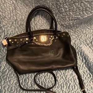 Victoria’s Secret black pebbled faux leather bag with gold hardware, mirror